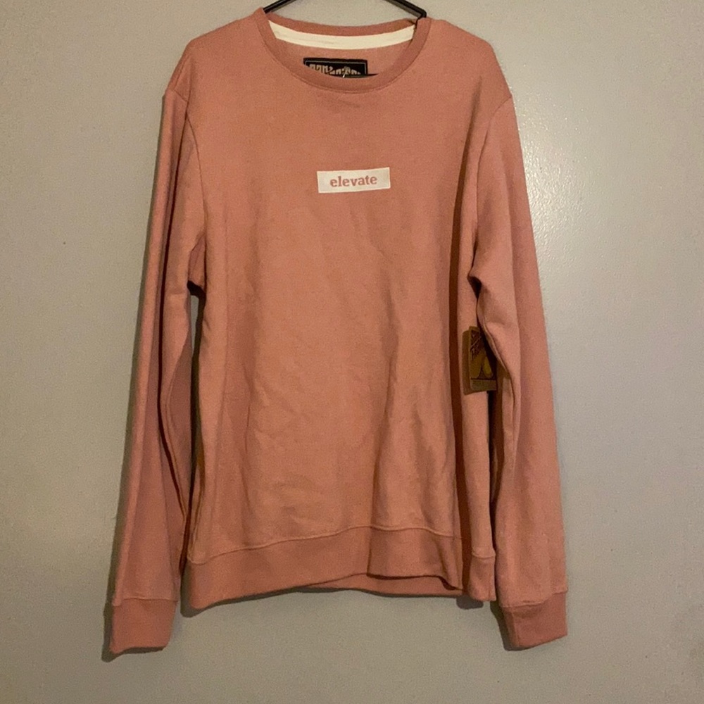 Long sleeve thick shirt. Never worn with tags